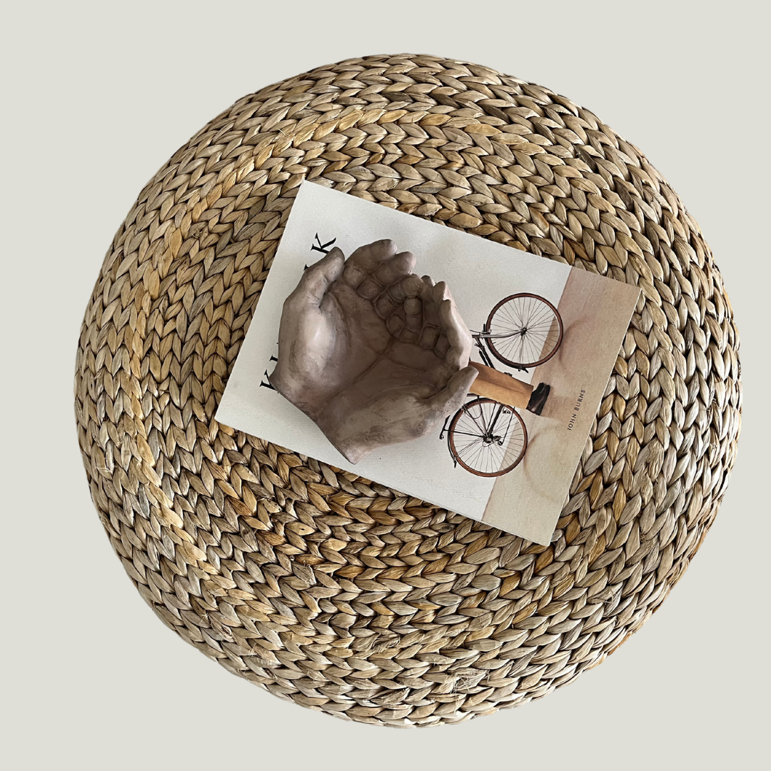 brown concrete hands bowl